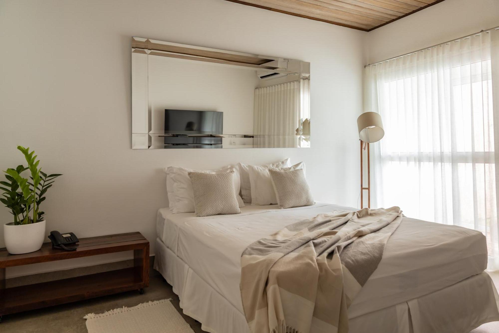 Hotel Boutique Frangipani Brotas Luaran gambar A bedroom